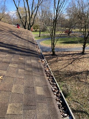 2 story house, gutter cleaning - End of season gutter cleaning on a 2-story house. 2 story house, gutter cleaning - End of season gutter cleaning on a 2-story house.