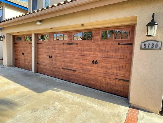 Carriage House Garage Doors - Carriage house garage doors
Long panels with light finish texture
Clear windows LC-695
And decorate hardware