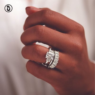 Wedding Bands - Discover the ultimate expression of love with our exquisite wedding bands, crafted by a top jeweler in Chicago. Each ring features a series of radiant diamonds set in a sleek platinum band, blending modern sophistication with timeless beauty. Our custom designs symbolize everlasting commitment and capture the essence of your special day. Adorn your love story with unmatched elegance. Explore our bespoke collection at the premier jeweler in Chicago and experience exceptional craftsmanship today! Wedding Bands - Discover the ultimate expression of love with our exquisite wedding bands, crafted by a top jeweler in Chicago. Each ring features a series of radiant diamonds set in a sleek platinum band, blending modern sophistication with timeless beauty. Our custom designs symbolize everlasting commitment and capture the essence of your special day. Adorn your love story with unmatched elegance. Explore our bespoke collection at the premier jeweler in Chicago and experience exceptional craftsmanship today!