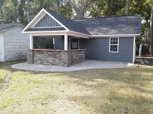 Outdoor Entertainment - Outdoor Cooking and Entertainment area.  Pavers in Herringbone pattern, cultured stone walls with Natural stone tops.
