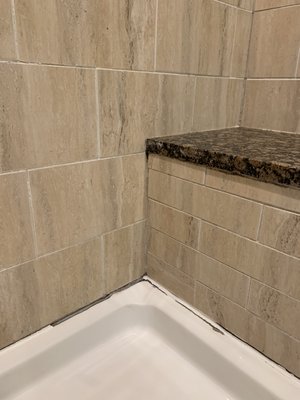 Regrout and Recalk shower - Grout Best LLC successfully resolved a leakage issue in the shower by regrouting and recaulking, ensuring the walls were thoroughly sealed.