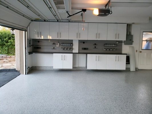 Garage Makeover with Epoxy Floor - A garage turned into a clean, organized space: a durable flake epoxy floor, white storage cabinets and slat wall panels that keep tools off the floor.
Want something similar? Send us a few photos and a short description of your space, and we'll get back to you with a quote for your project. Garage Makeover with Epoxy Floor - A garage turned into a clean, organized space: a durable flake epoxy floor, white storage cabinets and slat wall panels that keep tools off the floor.
Want something similar? Send us a few photos and a short description of your space, and we'll get back to you with a quote for your project.
