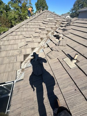 Tile Roof Maintenance - Here we have a project where we did some maintenance work for a tile roof. The repairs we did were cleaning valleys ( 50 linear feet) , cleaning the chimney flashing, and we found out that there was debris stuck in the vent flashings,the debris has been stuck in the flashings for years. We also patched a leak that we found due to a slipped tile.

This project was quoted $1,000 labor and materials.