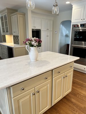 kitchen Remodel - This is a complete kitchen remodel. Cabinetry refinish, countertop replacement and floor refinished.