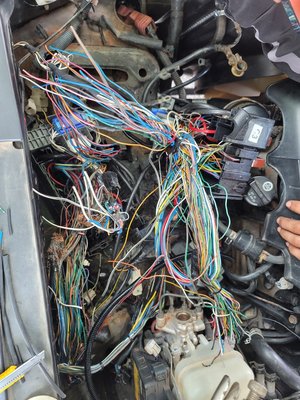 2007 Toyota FJ Cruiser fuse box swap - This vehicle was purchased at an auction with electronics failure. Purchaser recognized the burned fuse box and purchased a replacement. We carefully disected the burned wires and seperated what we could. We transplanted each wire one by one and matched it with our donor fuse box soldering and heat shrinking each wire individually. This was a total of 87 wires mostly 22 guage that took 8 hours to conplete.