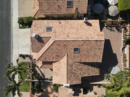 Huntington Beach Lift and relay - This project consisted of lifting the existing tiles, removing underlayment, inspecting wood, installing a new synthetic underlayment, and reinstalling existing tiles.