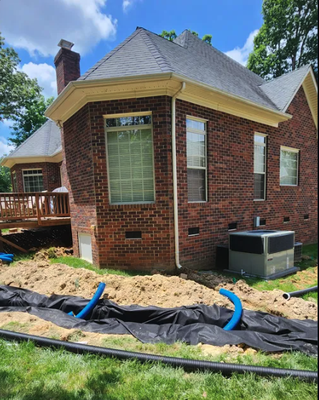 Gutter Downspout Extensions - Keep water away from your foundation with professional gutter downspout extensions from Drain My Lawn. Our team installs custom solutions to protect your home from flooding, erosion, and yard damage. Serving Charlotte metro, Monroe, and Waxhaw Gutter Downspout Extensions - Keep water away from your foundation with professional gutter downspout extensions from Drain My Lawn. Our team installs custom solutions to protect your home from flooding, erosion, and yard damage. Serving Charlotte metro, Monroe, and Waxhaw