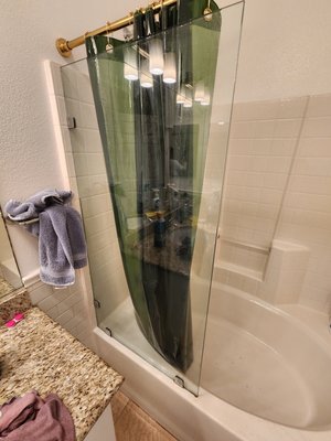 Shower Glass Cleaning - Voila! Beautiful shower doors again!