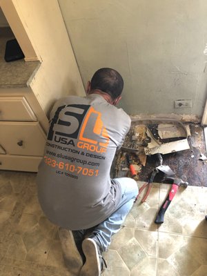 Partial Small Kitchen Remodel - This is a small kitchen where we did a few changes.  The client wanted to keep the existing cabinets so we replaced the floor, countertop, backsplash and painted the cabinets. You don't need to have a large budget in order to make just enough changes to upgrade your kitchen and give it a new look.