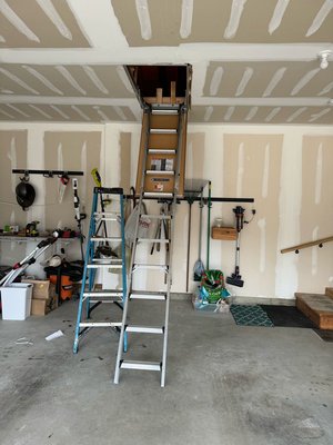 Pull down stair. - This pull down stairs, was installed in the center of the garage to have an easy access to the attic and prevent the home owner to move the cars every time he needs to reach to the attic, home owner used to have his attic access in the middle of the hallway with out a pull down stairs, every single time he needs to reach the attic he used to bring inside the house a stepladder, our team also installed plywood in the attic to give home owner more storage space and an easy access to the machines. Pull down stair. - This pull down stairs, was installed in the center of the garage to have an easy access to the attic and prevent the home owner to move the cars every time he needs to reach to the attic, home owner used to have his attic access in the middle of the hallway with out a pull down stairs, every single time he needs to reach the attic he used to bring inside the house a stepladder, our team also installed plywood in the attic to give home owner more storage space and an easy access to the machines.