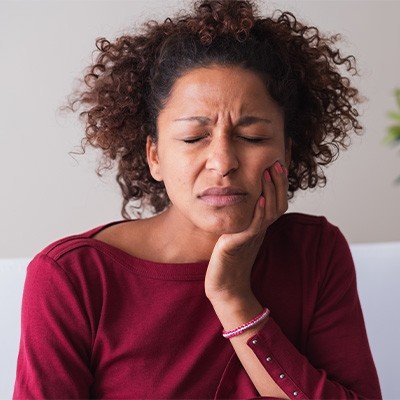 What is TMJ Disorder? - The temporomandibular joints, located on either side of the head, connect the jaw to the skull and allow for the opening and closing of the mouth. This unique joint consists of the rounded bone of the upper jaw and a cartilage disc, held together by ligaments that guide jaw movement.
TMJ disorder refers to any issue that causes jaw pain and hinders the proper function of this complex joint, which includes the muscles, ligaments, discs, and bones.
Symptoms of TMJ Disorder
TMJ disorder can lead to a wide range of symptoms, with some of the most common including:
Jaw pain and tenderness
Sore facial muscles
Headaches and migraines
Earaches
Ringing in the ears (tinnitus)
Lockjaw sensation
Limited jaw movement
Pain behind the eyes
Worn teeth caused by bruxism
Back and neck pain
General musculoskeletal discomfort
If you experience any of the above symptoms, give us a call to schedule your next appointment right away. Dr. Parmar will be able to discuss your concerns, investigate your symptoms, and help determine how to best address your TMJ disorder. What is TMJ Disorder? - The temporomandibular joints, located on either side of the head, connect the jaw to the skull and allow for the opening and closing of the mouth. This unique joint consists of the rounded bone of the upper jaw and a cartilage disc, held together by ligaments that guide jaw movement.
TMJ disorder refers to any issue that causes jaw pain and hinders the proper function of this complex joint, which includes the muscles, ligaments, discs, and bones.
Symptoms of TMJ Disorder
TMJ disorder can lead to a wide range of symptoms, with some of the most common including:
Jaw pain and tenderness
Sore facial muscles
Headaches and migraines
Earaches
Ringing in the ears (tinnitus)
Lockjaw sensation
Limited jaw movement
Pain behind the eyes
Worn teeth caused by bruxism
Back and neck pain
General musculoskeletal discomfort
If you experience any of the above symptoms, give us a call to schedule your next appointment right away. Dr. Parmar will be able to discuss your concerns, investigate your symptoms, and help determine how to best address your TMJ disorder.