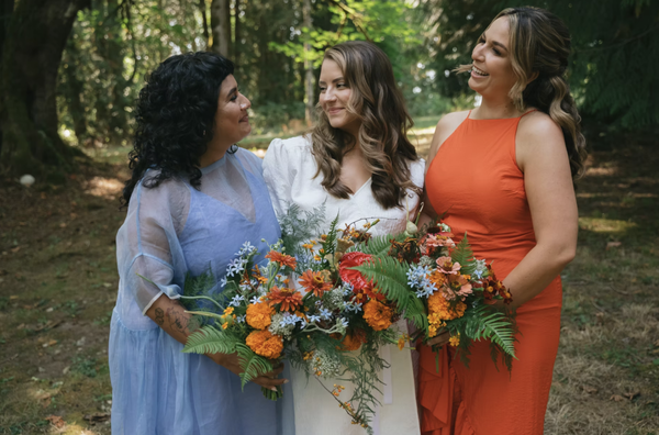 Tomato Wonderland Wedding at Anker - What we're about...
Celebrating and honoring all love and unions -
creating a safe space for LGBTQIA+ couples and community.
Creating whimsical, elegant and eclectic floral designs
with the most unique flowers and foliage possible.
Sourcing organically grown flowers hyper-locally from our very
own garden and local farmers across the Olympic Peninsula.
Emphasizing the sacredness of seasonality by honoring flowers in their most
natural states and growing stages (e.g., without artificial dyes and pesticides).
Utilizing sustainable, earth-loving methods and mechanics -
we are 100% foam free and we compost all of our waste product post event!
Creatively repurposing floral arrangements by making installations
and arrangements that can be relocated and admired more than once during your event. Tomato Wonderland Wedding at Anker - What we're about...
Celebrating and honoring all love and unions -
creating a safe space for LGBTQIA+ couples and community.
Creating whimsical, elegant and eclectic floral designs
with the most unique flowers and foliage possible.
Sourcing organically grown flowers hyper-locally from our very
own garden and local farmers across the Olympic Peninsula.
Emphasizing the sacredness of seasonality by honoring flowers in their most
natural states and growing stages (e.g., without artificial dyes and pesticides).
Utilizing sustainable, earth-loving methods and mechanics -
we are 100% foam free and we compost all of our waste product post event!
Creatively repurposing floral arrangements by making installations
and arrangements that can be relocated and admired more than once during your event.