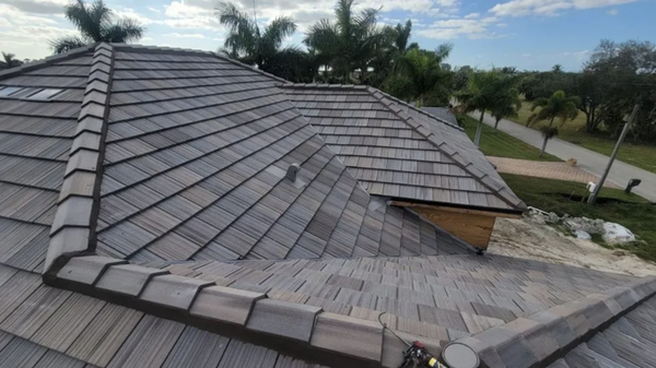 Slate Tile Roofing System - New Construction - We strive to save you both time and money by combining our use of roofing knowledge, the highest quality parts and equipment, and our dedication to delivering exceptional service. We will not leave the job until it is finished and you are satisfied with the results. Slate Tile Roofing System - New Construction - We strive to save you both time and money by combining our use of roofing knowledge, the highest quality parts and equipment, and our dedication to delivering exceptional service. We will not leave the job until it is finished and you are satisfied with the results.