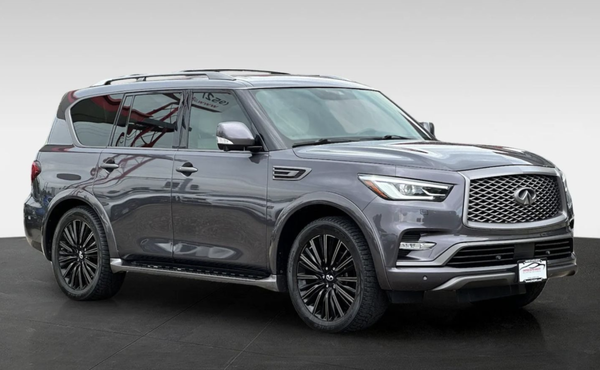 2019 INFINITI QX80 - Experience full-size luxury and commanding capability with this 2019 INFINITI QX80 LIMITED 4WD. Finished in a refined Gray exterior over an exclusive Beige & Black Alcantara interior, this flagship SUV offers premium craftsmanship, advanced technology, and powerful performance. With 92k miles, it has been carefully maintained and is fully equipped to deliver first-class comfort for every drive.