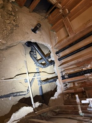 Bathroom Remodel: Under-Slab Drain Replacement - During a bathroom remodel, our inspection of the home's 65-year-old drain system revealed collapsed and failing piping beneath the slab. After reviewing the findings, the homeowner chose a complete under-slab drain replacement rather than continuing with spot repairs. Hughes Plumbing Services removed the failed sections and installed a new ABS drain system with updated connections and cleanouts. We protected the interior work areas throughout the project and completed the installation cleanly and professionally. Bathroom Remodel: Under-Slab Drain Replacement - During a bathroom remodel, our inspection of the home's 65-year-old drain system revealed collapsed and failing piping beneath the slab. After reviewing the findings, the homeowner chose a complete under-slab drain replacement rather than continuing with spot repairs. Hughes Plumbing Services removed the failed sections and installed a new ABS drain system with updated connections and cleanouts. We protected the interior work areas throughout the project and completed the installation cleanly and professionally.