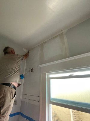 Patching a cutout in drywall - After cleaning the wall space from fungus, my task was to patch the large cutout in the wall with drywall.