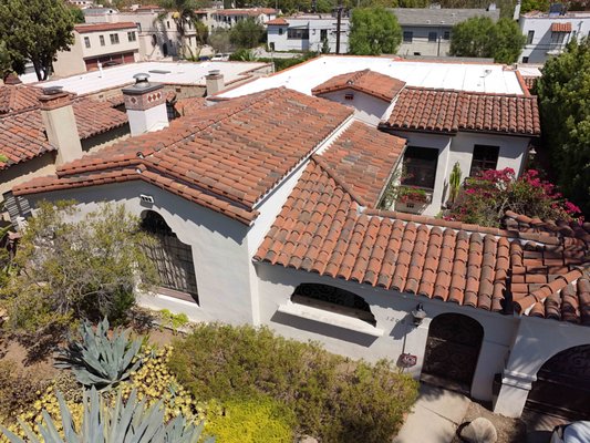 Los Angeles Spanish Tile Roof Reset - Spanish Tile Roof Reset in Los Angeles: Preserving the Character, Rebuilding the Protection

We recently completed a full Spanish tile roof reset for a homeowner in Los Angeles, and projects like this are a great reminder that restoring an older tile roof is very different from simply installing a new one.

With many historic and early-20th-century homes throughout Los Angeles, the tiles themselves can be nearly 100 years old. When they’re still in good condition, preserving and reinstalling those original tiles can help maintain the character of the home while giving the roofing system underneath a completely new life.

A tile reset typically involves carefully removing the existing tiles, replacing the aged waterproofing underlayment and necessary flashings, then reinstalling the original tile over the restored roof system.

Sounds straightforward. It often isn’t.

Older Los Angeles tile projects can involve Building & Safety inspections, specific code requirements, and, depending on the property, historic-preservation review or architectural restrictions. The work has to satisfy modern roofing standards without destroying the appearance that made the home special in the first place.

Then there’s the tile itself.

When you're working with clay tile that has been on a roof for generations, you can't simply run down to the supply house and buy an exact replacement. Profiles, dimensions, firing methods and colors have changed over the decades. If an original tile breaks during removal—or previous damage has already left pieces missing—finding a suitable match can become its own project.

That means every tile has to be handled with care.

Our tile crews spend an enormous amount of time sorting, inspecting and preserving usable pieces, identifying where replacement tiles can be incorporated without disrupting the appearance of the roof, and making sure the finished installation looks like it belongs on the home.

We try not to brag too much, but this is where having experienced tile roof specialists really matters.

Our crews know how to walk these roofs, remove old clay without unnecessarily breaking it, rebuild the waterproofing system correctly, work around complicated flashing conditions, and put a century-old roof back together so that it still looks authentic when the job is finished.

The result on this Los Angeles home was exactly what we wanted: the historic Spanish tile appearance remained, while the roofing system underneath was renewed for the years ahead.

If you own an older Spanish tile home and have been told you need an entirely new roof, don't assume the original tile has to be thrown away. In many cases, a professionally planned tile reset can preserve the beauty of the existing roof while replacing the components that have actually reached the end of their service life.

LionRidge Roofing & Roof Repair
Spanish Tile Roof Repair • Tile Resets • Underlayment Replacement • Historic Roof Restoration
Serving Los Angeles and surrounding communities.