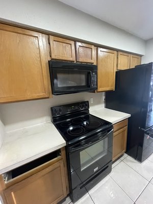 Small Kitchen Remodel - This kitchen was in desperate need of a modern upgrade — and the results speak for themselves! We removed the outdated fur-down above the cabinets, repaired the drywall, and replaced the old 30” cabinets with stunning 42” gray shaker-style cabinets featuring soft-close mechanisms for a touch of luxury.
Beautiful 3 cm Calacatta quartz countertops and a partial quartz backsplash add timeless elegance, while a striking Ombre Grigia glass mosaic accent tile at the stove and sink creates the perfect visual centerpiece.
From outdated to outstanding — this remodel redefines modern style and functionality! Small Kitchen Remodel - This kitchen was in desperate need of a modern upgrade — and the results speak for themselves! We removed the outdated fur-down above the cabinets, repaired the drywall, and replaced the old 30” cabinets with stunning 42” gray shaker-style cabinets featuring soft-close mechanisms for a touch of luxury.
Beautiful 3 cm Calacatta quartz countertops and a partial quartz backsplash add timeless elegance, while a striking Ombre Grigia glass mosaic accent tile at the stove and sink creates the perfect visual centerpiece.
From outdated to outstanding — this remodel redefines modern style and functionality!