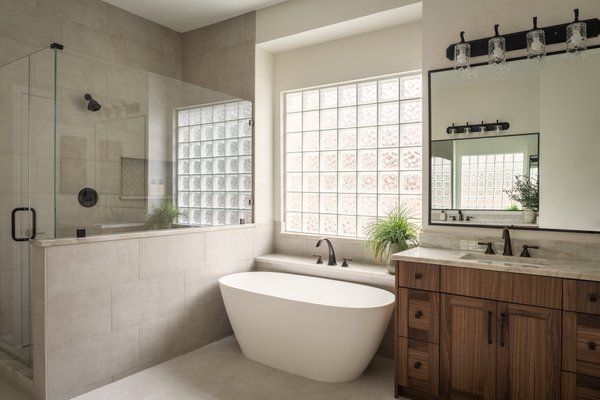 Allerford - The Allerford project was a full kitchen and bathroom renovation designed to create a brighter, more functional, and timeless living experience. The original layout felt closed off and outdated, with limited storage and finishes that no longer reflected the homeowners’ needs or style. Our goal was to reimagine these spaces with everyday practicality, refined materials, and elevated, luxury aesthetics.
The kitchen now features stunning Taj Mahal quartzite countertops—chosen for their durability, warm tone, and beautiful natural veining—paired with custom-built cabinetry that maximizes storage and brings a clean, modern look. Updated lighting, including integrated LED accents, enhances the stone’s texture and creates a bright, seamless workspace.
The bathroom was transformed into a spa-like retreat, prioritizing comfort, relaxation, and thoughtful functionality. High-end finishes, a calming color palette, and intentional material selections work together to create a refreshing, indulgent atmosphere that feels like an escape inside the home.
This renovation blends quality craftsmanship with cohesive design to deliver a beautifully upgraded living environment. The Allerford project showcases how strategic planning and premium materials can completely redefine a home’s most essential spaces. Allerford - The Allerford project was a full kitchen and bathroom renovation designed to create a brighter, more functional, and timeless living experience. The original layout felt closed off and outdated, with limited storage and finishes that no longer reflected the homeowners’ needs or style. Our goal was to reimagine these spaces with everyday practicality, refined materials, and elevated, luxury aesthetics.
The kitchen now features stunning Taj Mahal quartzite countertops—chosen for their durability, warm tone, and beautiful natural veining—paired with custom-built cabinetry that maximizes storage and brings a clean, modern look. Updated lighting, including integrated LED accents, enhances the stone’s texture and creates a bright, seamless workspace.
The bathroom was transformed into a spa-like retreat, prioritizing comfort, relaxation, and thoughtful functionality. High-end finishes, a calming color palette, and intentional material selections work together to create a refreshing, indulgent atmosphere that feels like an escape inside the home.
This renovation blends quality craftsmanship with cohesive design to deliver a beautifully upgraded living environment. The Allerford project showcases how strategic planning and premium materials can completely redefine a home’s most essential spaces.