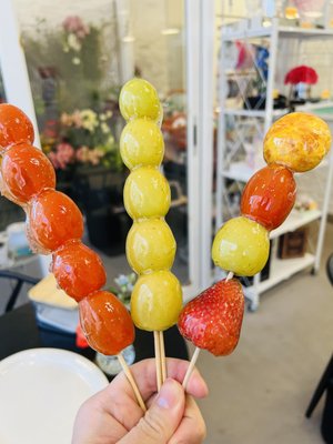 Sugar Coated Fruit (Tanghulu) - Introducing our authentic Chinese tanghulus – handmade, organic, and free from additives. These traditional treats are crafted with care, using time-honored methods. Enjoy the natural colors and crisp textures, a true taste of Chinese culinary heritage. Pure, simple, and delicious.