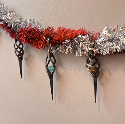 Holiday Ornament Class - Book your class online and Join us Saturdays from 11/15 - 01/04 and craft a unique and stunning holiday ornament! You’ll learn core blacksmithing techniques and take home a handcrafted ornament ready for your holiday display or gift exchange. Perfect for families, friends, dates, and team outings. No experience required! We welcome students of all ages 6+ unless otherwise noted on the course. Holiday Ornament Class - Book your class online and Join us Saturdays from 11/15 - 01/04 and craft a unique and stunning holiday ornament! You’ll learn core blacksmithing techniques and take home a handcrafted ornament ready for your holiday display or gift exchange. Perfect for families, friends, dates, and team outings. No experience required! We welcome students of all ages 6+ unless otherwise noted on the course.