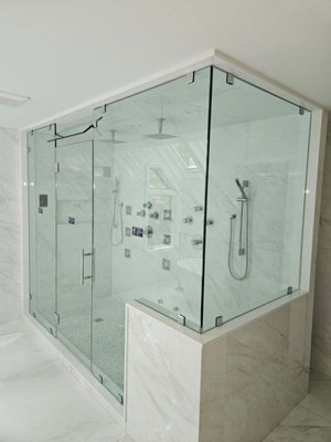 Custom Frameless Steam Shower - Heavy glass, Low Iron Steam shower with operable transom to let steam out. Custom Frameless Steam Shower - Heavy glass, Low Iron Steam shower with operable transom to let steam out.