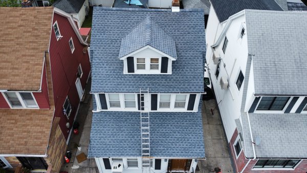 Pitched Roof New York - In this project, Attyx replaced the existing roof with a new, durable pitched roof designed to withstand New York’s varied climate. The job included installing high-quality architectural shingles that offer enhanced durability and curb appeal. Our expert team ensures proper ventilation and insulation to optimize energy efficiency while protecting your home from the elements. This new roofing system is built to last, providing superior water resistance, wind protection, and overall structural integrity. Pitched Roof New York - In this project, Attyx replaced the existing roof with a new, durable pitched roof designed to withstand New York’s varied climate. The job included installing high-quality architectural shingles that offer enhanced durability and curb appeal. Our expert team ensures proper ventilation and insulation to optimize energy efficiency while protecting your home from the elements. This new roofing system is built to last, providing superior water resistance, wind protection, and overall structural integrity.