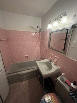 Bathroom renovation - We recently had the pleasure of creating a stunning bathroom transformation for some wonderful clients who have become like family to us. The space showcases large format terrazzo porcelain tiles paired with striking green tone glazed tiles arranged in a sleek stacked pattern. Notable features include a thoughtfully engineered curbless shower, complete with a modern linear drain and strategically positioned shower controls for easy access upon entering. These design elements ensure both style and functionality, addressing the unique needs of our special clients. We are thrilled to have crafted a beautiful and practical bathroom oasis for them Bathroom renovation - We recently had the pleasure of creating a stunning bathroom transformation for some wonderful clients who have become like family to us. The space showcases large format terrazzo porcelain tiles paired with striking green tone glazed tiles arranged in a sleek stacked pattern. Notable features include a thoughtfully engineered curbless shower, complete with a modern linear drain and strategically positioned shower controls for easy access upon entering. These design elements ensure both style and functionality, addressing the unique needs of our special clients. We are thrilled to have crafted a beautiful and practical bathroom oasis for them