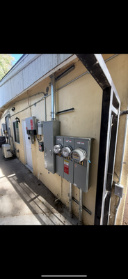 Panel Upgrade - Full service upgrade from existing 200A to new 3-meter system for ADU & JADU conversion.
Installed new multi-meter panel setup with dedicated meters for main house, ADU, and JADU. Completed all conduit runs, service equipment installation, and proper grounding/bonding per code. Clean, organized layout designed for long-term reliability and utility approval. Panel Upgrade - Full service upgrade from existing 200A to new 3-meter system for ADU & JADU conversion.
Installed new multi-meter panel setup with dedicated meters for main house, ADU, and JADU. Completed all conduit runs, service equipment installation, and proper grounding/bonding per code. Clean, organized layout designed for long-term reliability and utility approval.