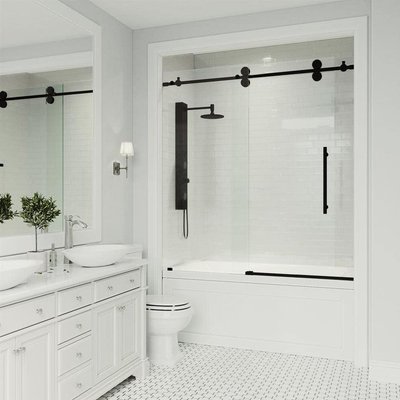 VIGO Elan 60 in. x 66 in. Frameless Sliding Tub Door in Matte Black - Product Details
Customizable and Adjustable
Right or left-side glass sliding shower or tub door installation accommodates any bathroom space.
Modern Hardware
Sleek, high-quality hardware adds a touch of luxury to any bathroom and delivers timeless style for a lifetime of performance.
Tempered Glass
All VIGO shower and tub doors are engineered with ANSI Z97.1 and 16 CFR 1201-certified tempered glass, making them extremely safe for everyday use.
Smart Adjust
Shower or tub door’s adjustability ensures the perfect fit for any bath space, whether walls are out of plumb or even.
Roller Disk
Glass shower and tub doors are engineered with 3⁄8 inches of adjustability for out-of-plumb walls.
Proprietary Seal Strip
Full-length seal strips on the door keep the shower watertight between the wall and glass door or fixed panel.
Variety of Finishes
Hardware finishes are available in matte black, matte gold, stainless steel and chrome.
User-Friendly Installation
Universal installation guide makes shower door installation seamless.
Finish-Plated
Rich hardware finish is consistent throughout, delivering a lifetime of brilliance and easy cleaning.
Flex-Sizing
Shower and tub doors for bath allow up to 4 inches of built-in adjustability during the installation process to provide the perfect fit.
Premium Hardware
Quality 304-series stainless constructed hardware with 7-layer plated hardware finish is guaranteed to never rust.
Silent Sliding Mechanism
Air-gliding glass doors deliver a quieter and more relaxing bathroom experience.
Industry Leading Design
VIGO designs are inspired by NYC architecture and influenced by customer feedback. VIGO Elan 60 in. x 66 in. Frameless Sliding Tub Door in Matte Black - Product Details
Customizable and Adjustable
Right or left-side glass sliding shower or tub door installation accommodates any bathroom space.
Modern Hardware
Sleek, high-quality hardware adds a touch of luxury to any bathroom and delivers timeless style for a lifetime of performance.
Tempered Glass
All VIGO shower and tub doors are engineered with ANSI Z97.1 and 16 CFR 1201-certified tempered glass, making them extremely safe for everyday use.
Smart Adjust
Shower or tub door’s adjustability ensures the perfect fit for any bath space, whether walls are out of plumb or even.
Roller Disk
Glass shower and tub doors are engineered with 3⁄8 inches of adjustability for out-of-plumb walls.
Proprietary Seal Strip
Full-length seal strips on the door keep the shower watertight between the wall and glass door or fixed panel.
Variety of Finishes
Hardware finishes are available in matte black, matte gold, stainless steel and chrome.
User-Friendly Installation
Universal installation guide makes shower door installation seamless.
Finish-Plated
Rich hardware finish is consistent throughout, delivering a lifetime of brilliance and easy cleaning.
Flex-Sizing
Shower and tub doors for bath allow up to 4 inches of built-in adjustability during the installation process to provide the perfect fit.
Premium Hardware
Quality 304-series stainless constructed hardware with 7-layer plated hardware finish is guaranteed to never rust.
Silent Sliding Mechanism
Air-gliding glass doors deliver a quieter and more relaxing bathroom experience.
Industry Leading Design
VIGO designs are inspired by NYC architecture and influenced by customer feedback.