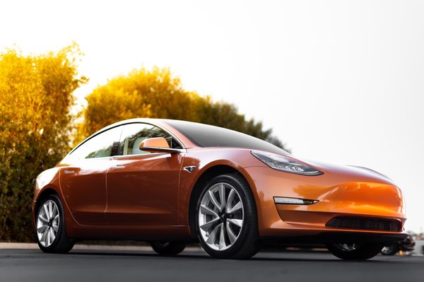 Liquid Copper Model 3 - This brand new Tesla Model 3 received quite a facelift. Went from a factory gloss white to a 3M Gloss Liquid Copper. It also got ceramic coated with Beadlock Pro to make cleaning easier and to protect the film from exterior elements.
