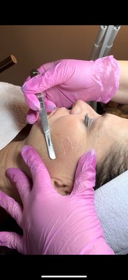 Glowing Facial - Double cleanse, exfoliation using Dermaplane tool and chemical peel, steamer with hand and arm massage, extractions, then custom mask with shoulder neck and head massage, finished with serums and hydrators with lymphatic massage technique. Glowing Facial - Double cleanse, exfoliation using Dermaplane tool and chemical peel, steamer with hand and arm massage, extractions, then custom mask with shoulder neck and head massage, finished with serums and hydrators with lymphatic massage technique.