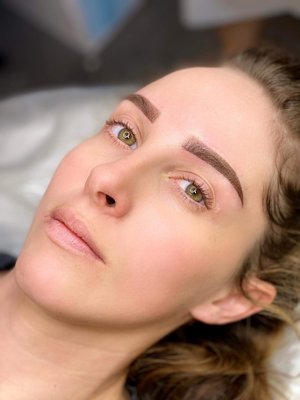 Ombre powder brows - This beautiful client asked for the brows shape that make her appear more youthful. The straight, lifted tails and shoft arches do the magic