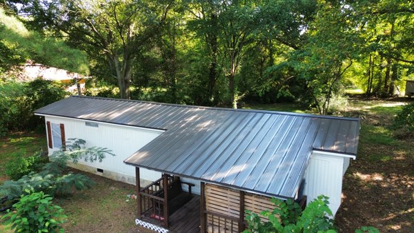 Jerry Plumley Metal roof installation - We was able to install metal roof on top of this existing roof. Roof was installed with all accesories Jerry Plumley Metal roof installation - We was able to install metal roof on top of this existing roof. Roof was installed with all accesories