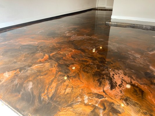 Metallic Epoxy Flooring - Custom color selections, durable and low maintenance. Top coat is bulletproof! Metallic Epoxy Flooring - Custom color selections, durable and low maintenance. Top coat is bulletproof!