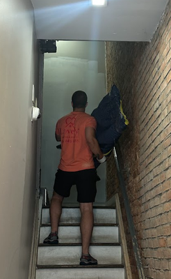97°F outside, four flights of stairs, and another successful move completed. - Hot weather doesn't change how we move. It just means we drink more water and take extra care.

A lot of people think stair moves have to be stressful, but when they're done the right way, they're not.

Before anything leaves the apartment, every piece of furniture is wrapped with moving blankets and stretch wrap to protect it from scratches, dents, and dirt. On the stairs, there are no shortcuts. We move one step at a time, communicate with each other, and make sure every item is carried safely from start to finish.

Whether it's a fifth-floor walk-up, a narrow staircase, or a heavy dresser that barely fits around the corner, experience makes the difference. Moving isn't about carrying things as fast as possible-it's about protecting what's important to our customers.

From walk-up apartments in NYC to long-distance relocations across the country, stairs have never been a problem for us. We provide local moves within 200 miles and long-distance moving services up to 1,000 miles. Whether you're moving a studio apartment, a family home, or an office, we bring the same level of care, preparation, and attention to every move.