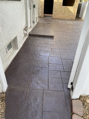 Stamped concrete Patio/ Concrete garage floor - The pictures show a stamped concrete patio and a concrete garage floor that we completed for a client. Concretes inherent strength, durability and low maintenance make it a great medium to improve any commercial and residential property. Clients can also enhance any project by incorporate decorative finishes like colors, stamps, and polishes.