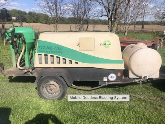 Mobile Media Blasting Services - When it comes to mobile media blasting, American Flo Blasting is the leading provider in Southwest Michigan. Big enough to handle even the toughest requests but small enough to travel to your location, we can accommodate a wide range of requests, including graffiti removal, fire restoration, and smoke damage cleaning. Our experienced, professional team will work with you to understand your concerns, identify the correct solutions, and deliver on your expectations. Whether you’re a homeowner looking to clean the exterior of your property, or a massive manufacture interested in removing flash from your molded products, we can help. If you have any questions about the services we offer, the products that we use, or the issues that we can assist with, we encourage you to reach out to us today!