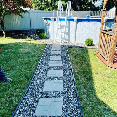 Green Giants - This Pathway was done with white Delaware stone and plastic edging. Creating a neat view and avoiding getting the pool dirty. The customer was amazed and extremely happy with the job. Green Giants - This Pathway was done with white Delaware stone and plastic edging. Creating a neat view and avoiding getting the pool dirty. The customer was amazed and extremely happy with the job.