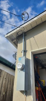 200Amp Overhead Panel Upgarde - In this project we decided to go with a Main 200amp Panel with only Main Breaker due to the space limitations. We added a 200amp Load center inside the garage. Panel had to be relocated because it did not complied with gas and working space clearances. 200Amp Overhead Panel Upgarde - In this project we decided to go with a Main 200amp Panel with only Main Breaker due to the space limitations. We added a 200amp Load center inside the garage. Panel had to be relocated because it did not complied with gas and working space clearances.