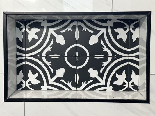 Custom Tilework- Bathroom Remodeling Project - Elegant tile details can completely redefine the character of a bathroom, adding charm, texture, and a touch of luxury. Combined with modern fixtures and a cohesive design, tile ornaments bring personality and timeless beauty to even the simplest spaces, making the bathroom both functional and visually captivating.