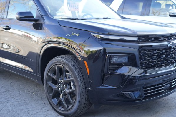 2024 Chevy Traverse Scratch - This customer bought a brand new 2024 Chevy Traverse and had an unfortunate new scratch that came with it.  In order to keep it looking new it was brought to us to professionally refinish her fender. Here are the results of this small repair.