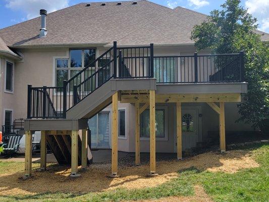 Custom Deck - Our customers previous deck was badly rotting and he began to feel unsafe using it so he had our team of professionals rebuild it. We tore the whole thing down and rebuilt it from the ground up. We installed Trex composite flooring and aluminum railing. Now the customer has a deck that he can be proud of and feel safe using. Custom Deck - Our customers previous deck was badly rotting and he began to feel unsafe using it so he had our team of professionals rebuild it. We tore the whole thing down and rebuilt it from the ground up. We installed Trex composite flooring and aluminum railing. Now the customer has a deck that he can be proud of and feel safe using.