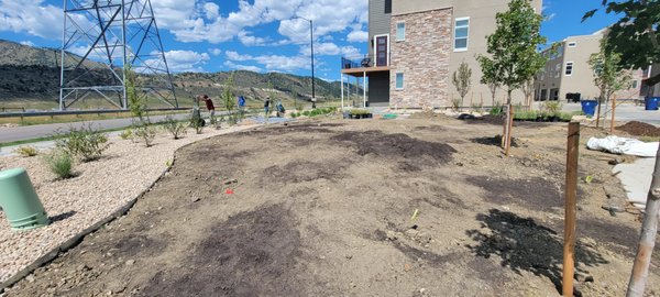 Solterra - The commercial landscaping installation project undertaken by Denver Outdoor Solutions in the Solterra neighborhood of Morrison, Colorado, was a comprehensive and multifaceted endeavor. From start to finish, the project aimed to transform the outdoor environment into a beautifully landscaped and functional space. Here's a breakdown of the project:
1. Initial Assessment and Planning: The project began with a thorough assessment of the site. This involved evaluating the existing landscape, soil quality, drainage issues, and any specific client requirements. Detailed planning was crucial to ensure that the final design would meet the needs and preferences of the client while adhering to local regulations.
2. Excavation and Grading: To prepare the site for landscaping, Denver Outdoor Solutions performed excavation and grading work. This process involved removing any unwanted materials, rocks, or debris and leveling the ground to create a smooth and even surface for the landscaping features.
3. Soil Enhancement: Soil quality plays a vital role in the success of landscaping projects. The team likely tested and improved the soil by adding nutrients and organic matter to create a fertile base for the new plantings.
4. Sod Installation: One of the central elements of the project was the installation of new sod. High-quality sod was laid down systematically across the designated areas. This step would provide an instant transformation of the landscape, creating lush, green lawns.
5. Mulch Application: Mulch was applied to various areas within the landscape. Mulch serves several purposes, including weed control, moisture retention, and temperature regulation, which are essential for maintaining healthy plants.
6. Plant Selection and Planting: Denver Outdoor Solutions carefully selected a variety of plants that would thrive in the Solterra neighborhood's climate and complement the overall design aesthetic. The installation team then planted these plants strategically, taking into account their growth habits and spacing requirements.
7. River Rock Installation: River rock was used as a decorative element to enhance the visual appeal of the landscape. It may have been strategically placed in areas such as pathways, around plant beds, or as a part of hardscape features.
8. Irrigation System: Ensuring proper irrigation is essential for the long-term health of the landscaping. Denver Outdoor Solutions likely installed an efficient irrigation system to provide the necessary water to the newly installed plants and sod.
9. Final Cleanup and Inspection: After completing the installation, the project would have included a thorough cleanup to remove any construction debris and ensure the site looked pristine. A final inspection was likely conducted to ensure all elements were installed correctly.
10. Client Handover and Maintenance Guidance: Denver Outdoor Solutions will provide the client with information on how to maintain the newly landscaped areas. This would include watering schedules, fertilization recommendations, and guidance on seasonal care.
In summary, the commercial landscaping installation project in the Solterra neighborhood in Morrison, Colorado, undertaken by Denver Outdoor Solutions, encompassed a wide range of services, from initial site preparation and soil enhancement to sod installation, plant selection, and decorative features like river rock. This comprehensive approach aimed to create an aesthetically pleasing and functional outdoor space that would thrive in the local climate and meet the client's requirements. Solterra - The commercial landscaping installation project undertaken by Denver Outdoor Solutions in the Solterra neighborhood of Morrison, Colorado, was a comprehensive and multifaceted endeavor. From start to finish, the project aimed to transform the outdoor environment into a beautifully landscaped and functional space. Here's a breakdown of the project:
1. Initial Assessment and Planning: The project began with a thorough assessment of the site. This involved evaluating the existing landscape, soil quality, drainage issues, and any specific client requirements. Detailed planning was crucial to ensure that the final design would meet the needs and preferences of the client while adhering to local regulations.
2. Excavation and Grading: To prepare the site for landscaping, Denver Outdoor Solutions performed excavation and grading work. This process involved removing any unwanted materials, rocks, or debris and leveling the ground to create a smooth and even surface for the landscaping features.
3. Soil Enhancement: Soil quality plays a vital role in the success of landscaping projects. The team likely tested and improved the soil by adding nutrients and organic matter to create a fertile base for the new plantings.
4. Sod Installation: One of the central elements of the project was the installation of new sod. High-quality sod was laid down systematically across the designated areas. This step would provide an instant transformation of the landscape, creating lush, green lawns.
5. Mulch Application: Mulch was applied to various areas within the landscape. Mulch serves several purposes, including weed control, moisture retention, and temperature regulation, which are essential for maintaining healthy plants.
6. Plant Selection and Planting: Denver Outdoor Solutions carefully selected a variety of plants that would thrive in the Solterra neighborhood's climate and complement the overall design aesthetic. The installation team then planted these plants strategically, taking into account their growth habits and spacing requirements.
7. River Rock Installation: River rock was used as a decorative element to enhance the visual appeal of the landscape. It may have been strategically placed in areas such as pathways, around plant beds, or as a part of hardscape features.
8. Irrigation System: Ensuring proper irrigation is essential for the long-term health of the landscaping. Denver Outdoor Solutions likely installed an efficient irrigation system to provide the necessary water to the newly installed plants and sod.
9. Final Cleanup and Inspection: After completing the installation, the project would have included a thorough cleanup to remove any construction debris and ensure the site looked pristine. A final inspection was likely conducted to ensure all elements were installed correctly.
10. Client Handover and Maintenance Guidance: Denver Outdoor Solutions will provide the client with information on how to maintain the newly landscaped areas. This would include watering schedules, fertilization recommendations, and guidance on seasonal care.
In summary, the commercial landscaping installation project in the Solterra neighborhood in Morrison, Colorado, undertaken by Denver Outdoor Solutions, encompassed a wide range of services, from initial site preparation and soil enhancement to sod installation, plant selection, and decorative features like river rock. This comprehensive approach aimed to create an aesthetically pleasing and functional outdoor space that would thrive in the local climate and meet the client's requirements.
