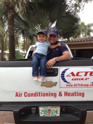 We train them young! - Our techs are highly experienced and well groomed and trained.  We offer residential AC repair, maintenance and new installations, as well as new construction projects, from a small house to a high rise building, we do it all!  Call us today for your project.  The baby in this picture is all grown up now!