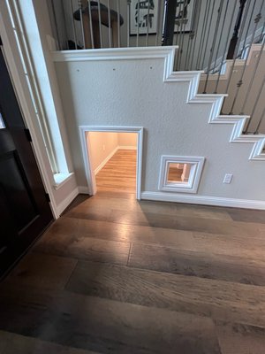 Pet Area Under Stairs - This remodel was to add an area for the family pets where they could rest away from all the activity in the house. There is a main entrance from the entry foyer and a secondary entrance from the hallway. Pet Area Under Stairs - This remodel was to add an area for the family pets where they could rest away from all the activity in the house. There is a main entrance from the entry foyer and a secondary entrance from the hallway.