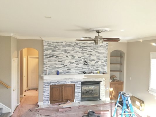 Roseville - Fireplace wall getting stone ledger installed & fireplace mantle getting quartz slab also fireplace base floor quartz slab Roseville - Fireplace wall getting stone ledger installed & fireplace mantle getting quartz slab also fireplace base floor quartz slab