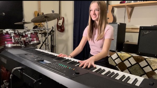 The Recording Studio - We have a modern teaching, recording, and filming facility with a homey touch. This space is ideal for leading students though the fun process of learning their favorite songs in MINUTES not MONTHS! We are regularly recording live instruments, filming for Youtube, audition videos, or other social media platforms, giving lessons on any of our four instruments offered, as well as hosting group lessons with our Rock Band Program.