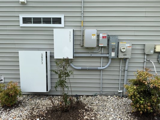 Retrofit Battery and Solar Add On - For this project, we gave an existing solar setup a serious boost. We added 3 new solar panels to increase production, installed a Franklin battery bank for backup power, and tied it all together with a new smart switch to manage the flow of energy between the home, the grid, and the battery. The system also got an upgraded AC disconnect to handle the added load, and we installed a soft starter for the homeowner’s air conditioning system to make it run more efficiently and reduce startup strain.

All in all, the result is a cleaner, stronger, and more resilient solar + storage system built to last.
