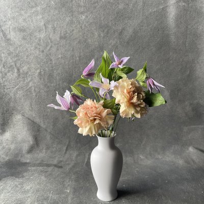 Petite Collection - With our petite collection we have addressed the issue of rising flower costs. We’ve created this new line of petite arrangements that are budget friendly but don’t compromise on style and design. The vases in this collection are meant to be just as much a part of the gift as the flowers themselves if not more so. This is the perfect solution for any occasion in which a modest acknowledgment is desired. The Petite Collection begins at $50 and all are eligible for delivery anywhere in Nashville.